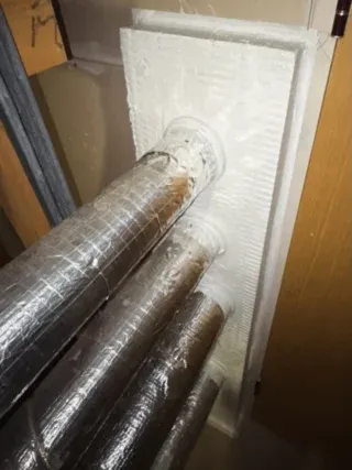 Coated batt system installed using best practice techniques to seal service penetrations and maintain fire compartmentation where insulated ductwork passes through a fire-rated wall.

#FireStopping #PassiveFireProtection #Compartmentation #FireSafetyUK